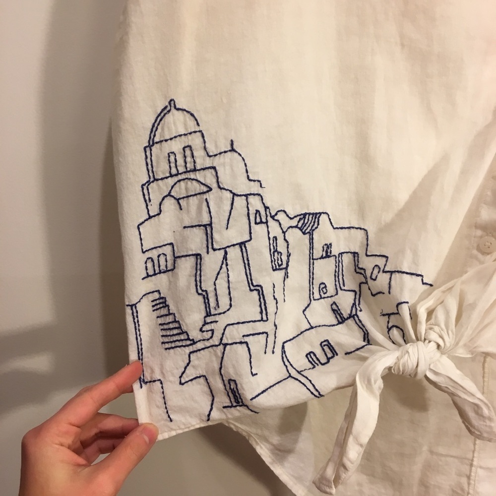 Hand embroidered white cotton button up blouse